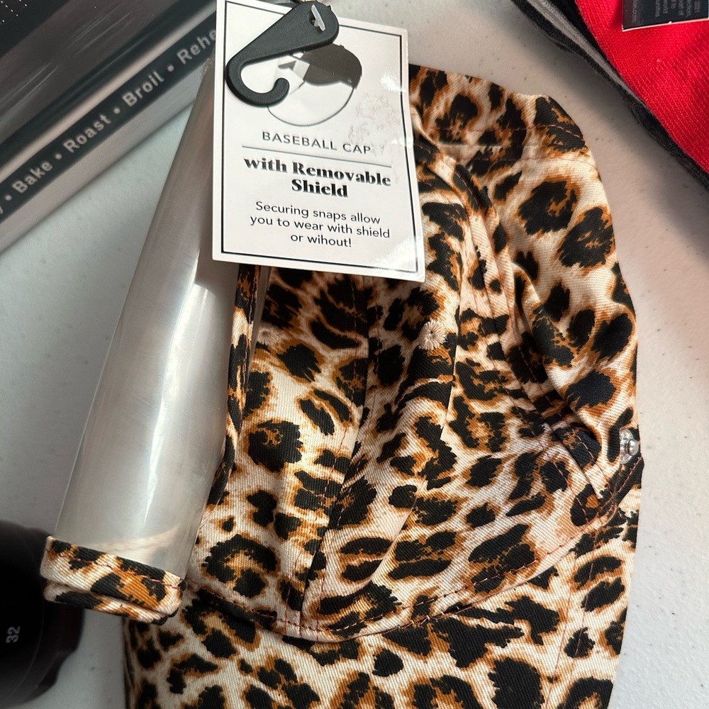 Brand new with Tag Hat with Removable Face Shield! Great for nurses etc